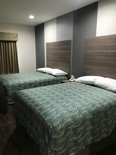 Bedroom 2, Grand Villa Inn & Suites - Humble, Houston