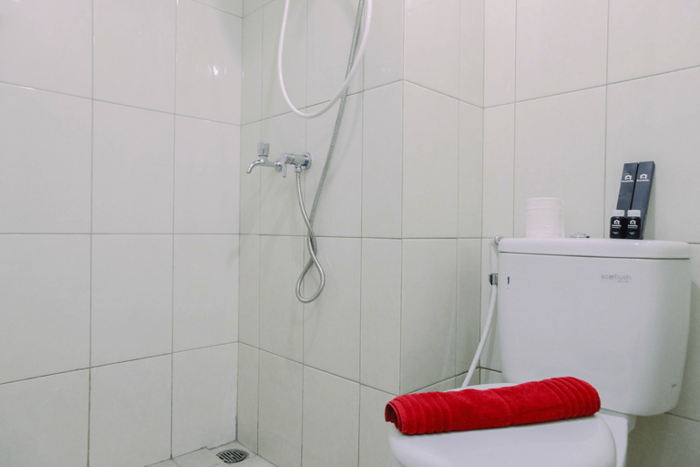 Bedroom 3, Modern Furnished Studio at Springlake Summarecon Bekasi Apartment By Travelio, Bekasi