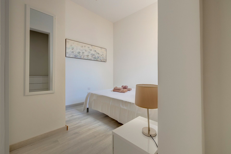 Bedroom 3, Chic 2BR Apartment, Ideal Location