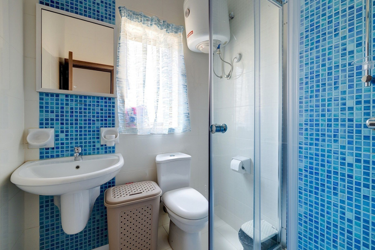 Bathroom, Modern 1BR Apartment Steps From the Promenade