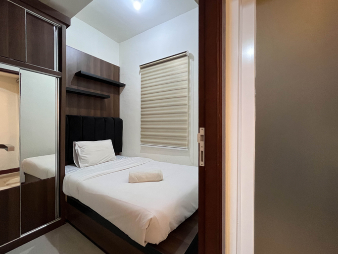 Bedroom 3, Warm and Cozy 2BR Vida View Makassar Apartment By Travelio, Makassar