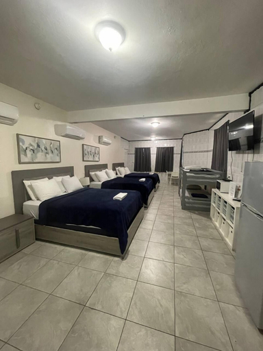 Bedroom 2, The Village Inn Hotel