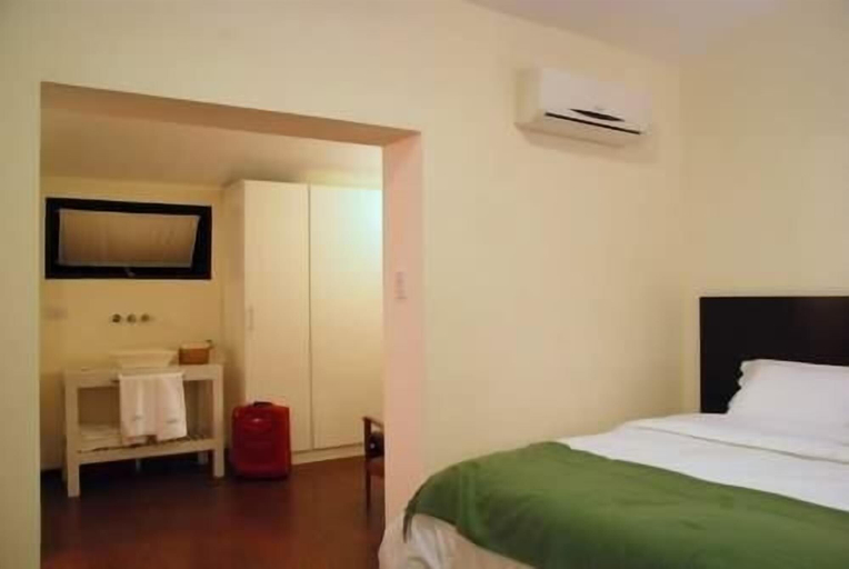 Bedroom 2, La Rozada Suites, Capital