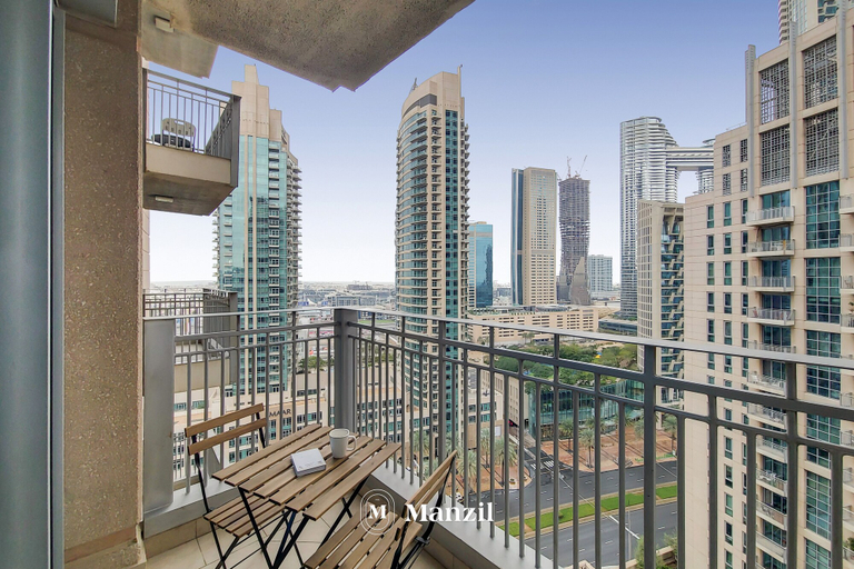 Balcony view 4, Manzil -Cozy 1BR Apt w/ Downtown Skyline Burj View, Dubai