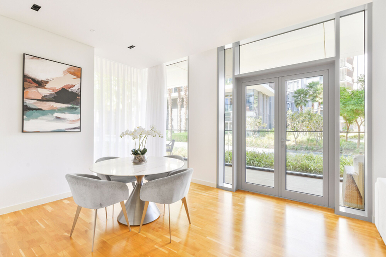 Dining room, Elegant 2BR with maids room and Ain View, Dubai