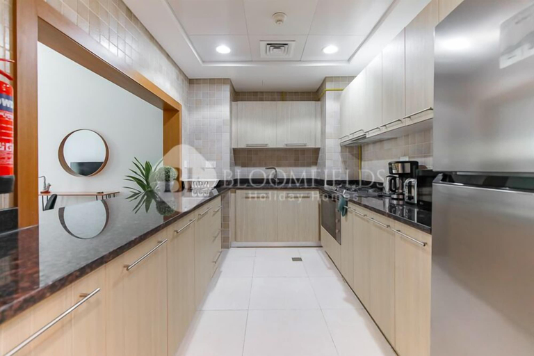 Private kitchen 4, Golf course view, stylish 2BR, Yas Island