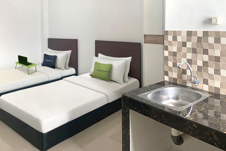 Urbanview Hotel Juanda Kota Agung by RedDoorz - Tap to explore photos