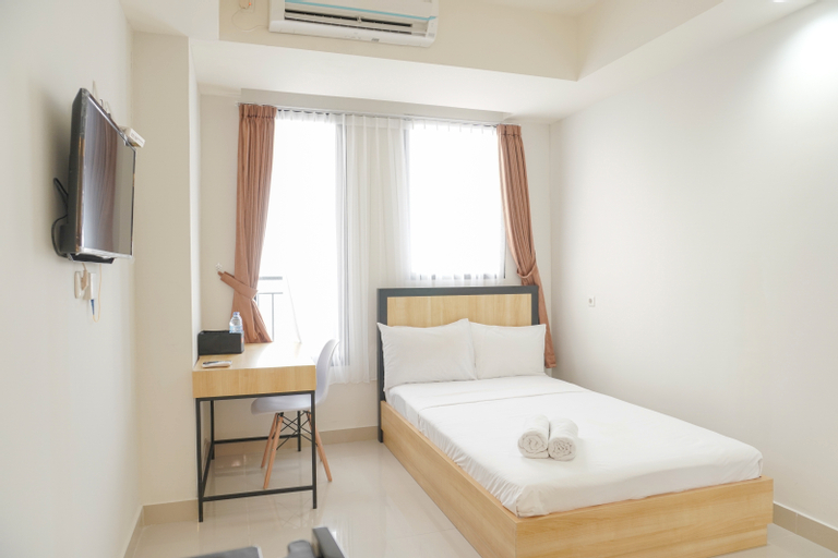 Bedroom 1, Minimalist and Homey Studio at Evenciio Margonda Apartment By Travelio, Depok