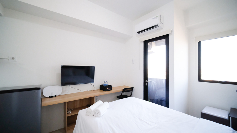 Bedroom 2, Comfy and New Studio at CitraLand Vittorio Apartment By Travelio, Surabaya