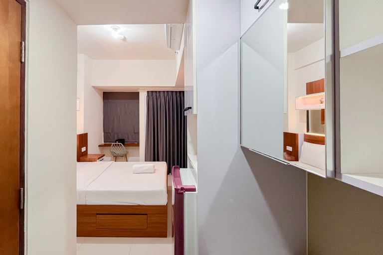 Bedroom 4, Scenic Studio Apartment at Vida View Makassar By Travelio, Makassar
