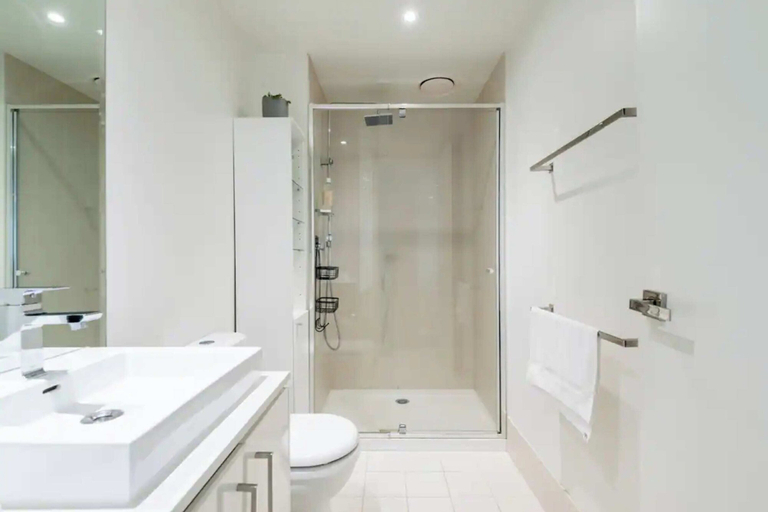 Bathroom, Charming 1BR in Fitzroy w/ Parking, Pool, + Gym!, Melbourne