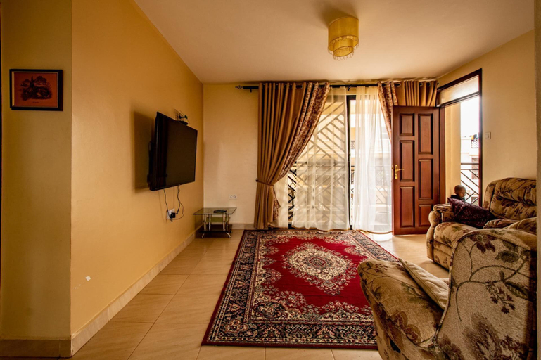 Living area 2, Stunning 3-bed Apartment in Najjera, Jinja