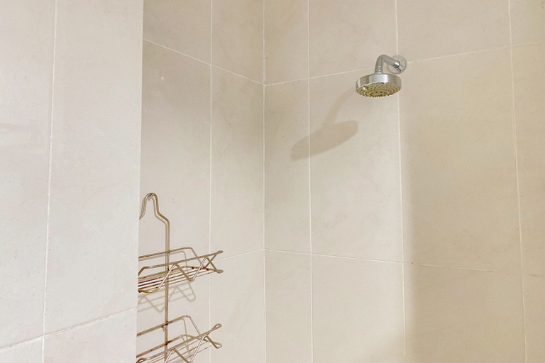 Bathroom 3, Great Location and Comfy 1BR Apartment at Capitol Park Residence By Travelio, Jakarta Pusat