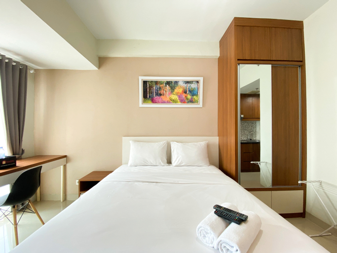 Bedroom 2, Warm and Cozy Living Studio Room Grand Dhika City Apartment By Travelio, Bekasi