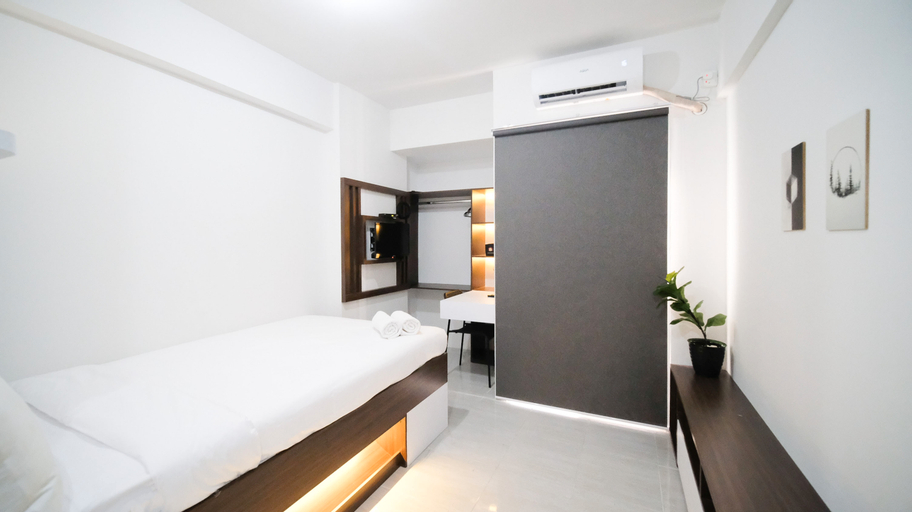 Modern and Simple Studio (No Kitchen) Apartment at Suncity Residence By Travelio, Sidoarjo
