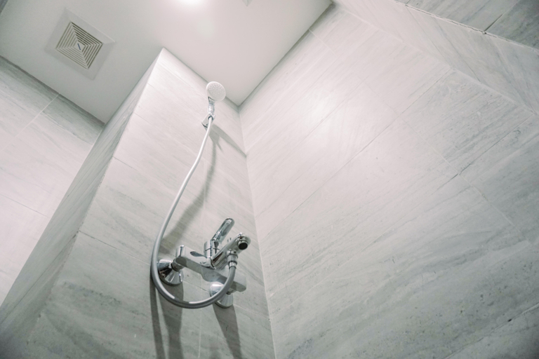 Bathroom, Homey and Comfort Living Studio Collins Boulevard Apartment By Travelio, Tangerang
