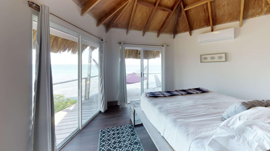 Bedroom 3, Thatch Caye, a Muy'Ono Resort