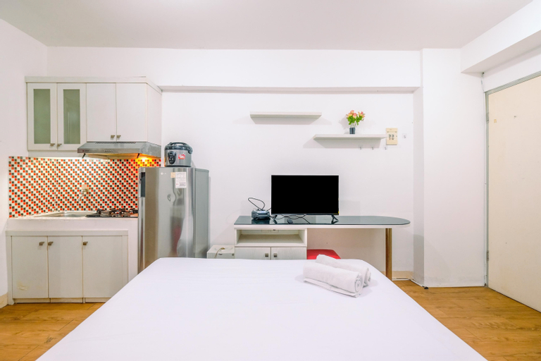 Bedroom 5, Homey and Fully Furnished Studio at Green Bay Pluit Apartment By Travelio, North Jakarta