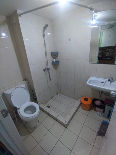 Bathroom 5, Nice pool view from studio room at Springlake Apartment Summarecon Bekasi, Bekasi