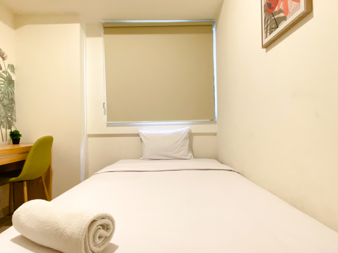 Bedroom 3, Spacious and Homey 2BR at Meikarta Apartment By Travelio, Cikarang