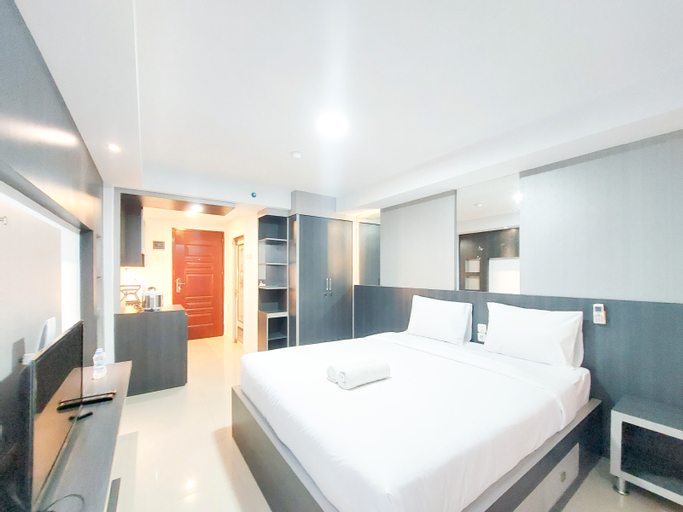 Bedroom 1, Homey and Warm Studio Apartment at Mansyur Residence By Travelio, Medan