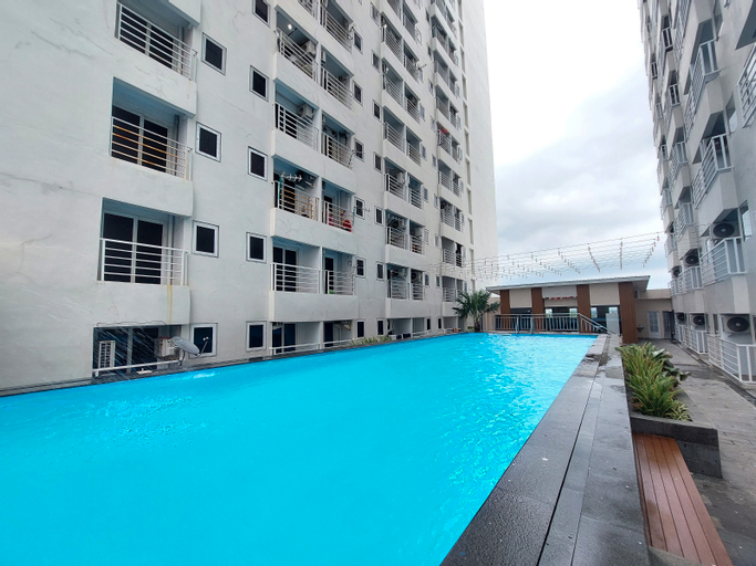 Sport & Beauty 4, Homey and Warm Studio Apartment at Mansyur Residence By Travelio, Medan