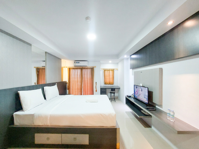 Bedroom 5, Homey and Warm Studio Apartment at Mansyur Residence By Travelio, Medan