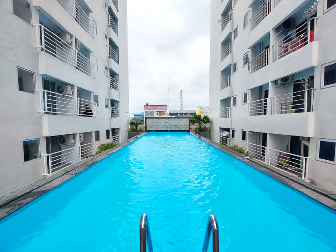 Sport & Beauty 3, Homey and Warm Studio Apartment at Mansyur Residence By Travelio, Medan