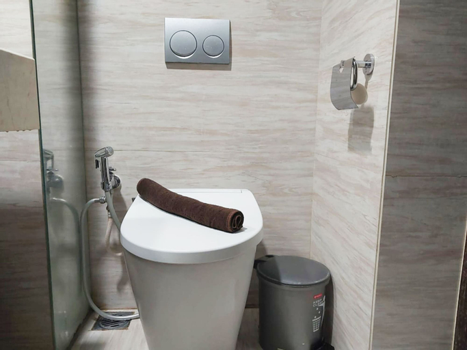 Bedroom 2, Modern Look 1BR at Uttara The Icon Apartment By Travelio, Sleman