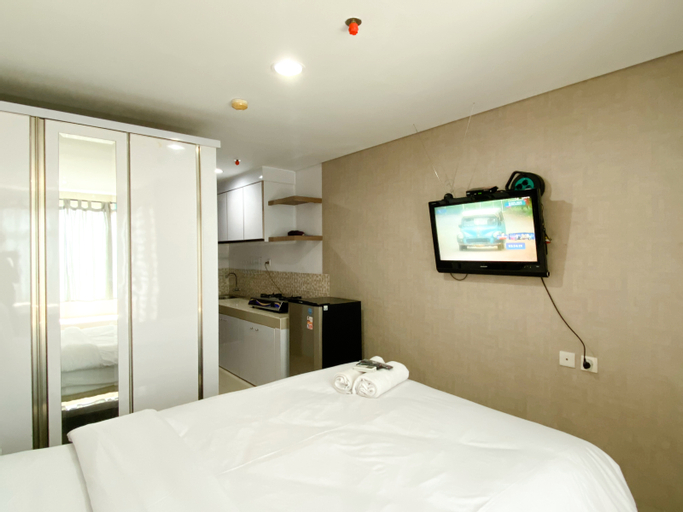 Bedroom 5, Restful and Tidy Studio at Enviro Apartment By Travelio, Cikarang