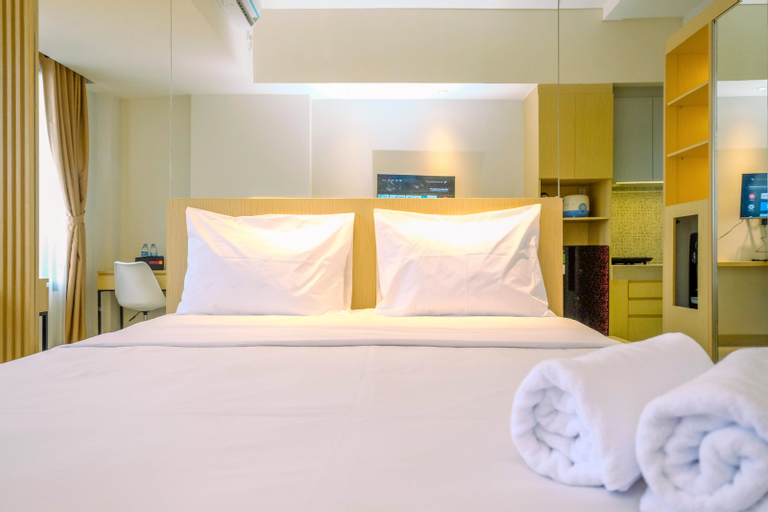 Bedroom 1, Comfy Minimalist Studio at Evenciio Margonda Apartment By Travelio, Depok