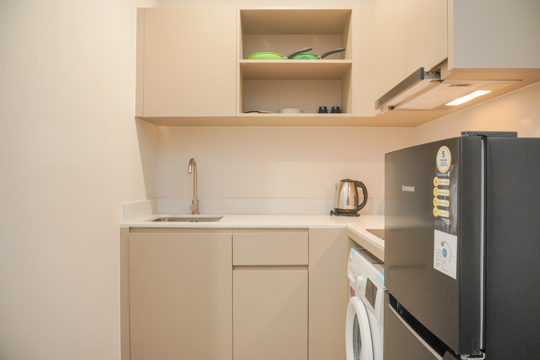 Dining Room, Minimalist and Comfort 1BR Menara Jakarta Kemayoran Apartment By Travelio, Central Jakarta