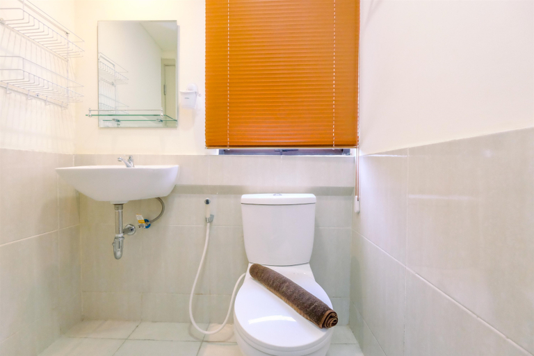 Bathroom, Modern and Simply 2BR at Meikarta Apartment By Travelio, Cikarang
