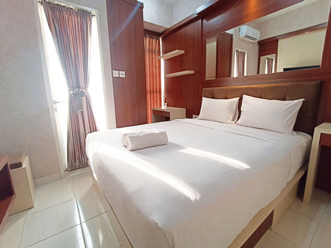 Bedroom 2, Modern Look and Homey Studio Amartha View Apartment By Travelio, Semarang