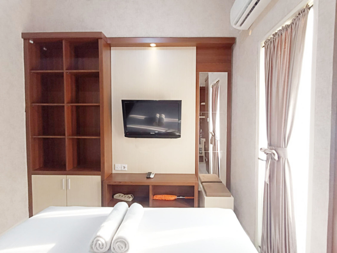 Bedroom 3, Modern Look and Homey Studio Amartha View Apartment By Travelio, Semarang