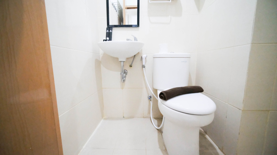 Bathroom 5, Best Location and Comfy 2BR at Bale Hinggil Apartment By Travelio, Surabaya