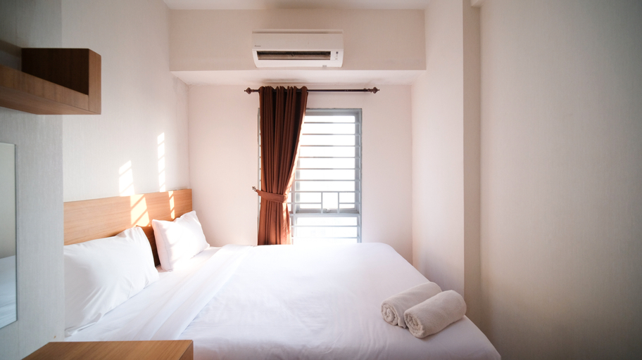 Bedroom, Clean and Comfy 1BR at Tamansari Prospero Apartment By Travelio, Sidoarjo