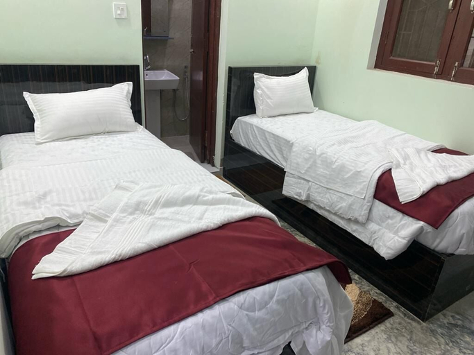 Bedroom 2, Royalwood City Inn, Koshi