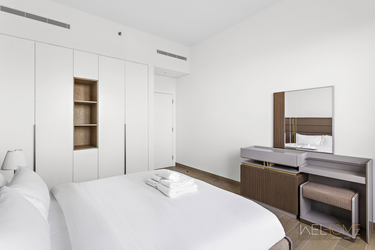 Bedroom 3, WelHome - Mesmerizing Sea & Burj Khalifa Views Apt at La Voile, Dubai