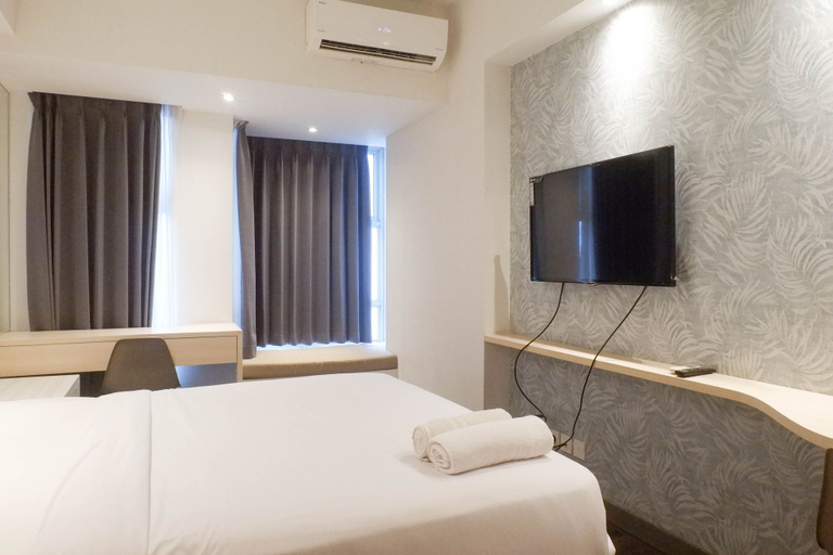 Bedroom, Modern Look Studio at Apartemen Superm, Surabaya