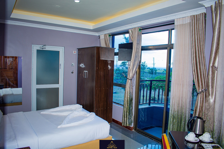Bedroom, HOTEL TAJI, Kieni