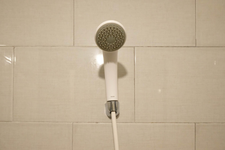 Bathroom 2, Warm Studio with Access to Mall at Supermall Mansion Apartment By Travelio, Surabaya