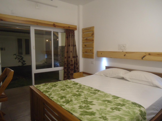 Bedroom 2, Greenberg cottages Mararikulam, Alappuzha