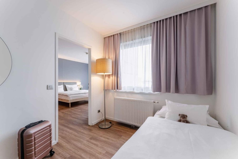 Bedroom 5, PLAZA INN Wien Gasometer, Wien