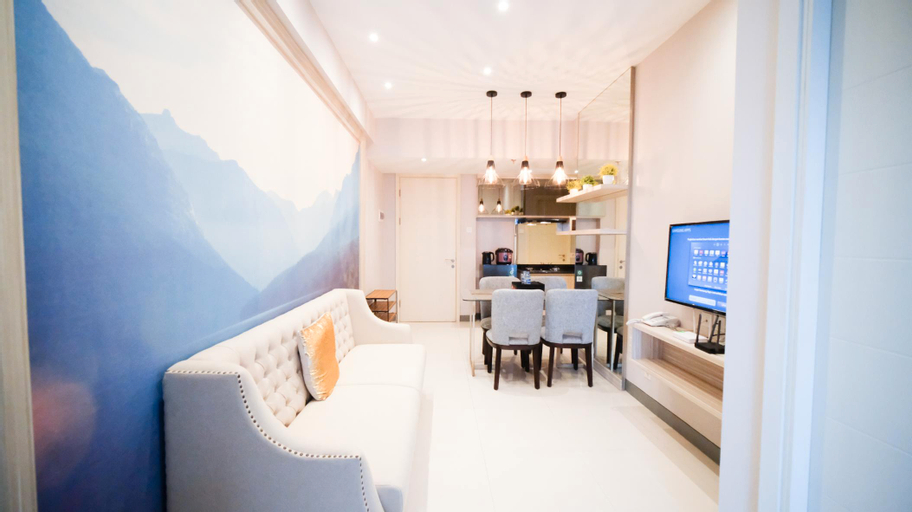 Living Room 3, Clean and Comfort Living 2BR at Anderson Supermall Mansion Apartment By Travelio, Surabaya