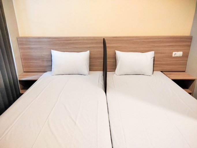 Wikost Premiere Inn Mitra RedDoorz - Tap to explore photos