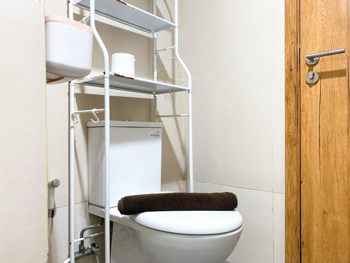 Bathroom 3, Good and Homey Studio at Gateway Park LRT City Bekasi Apartment By Travelio, Bekasi