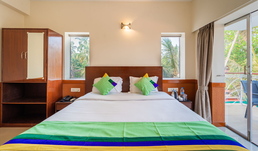 Bedroom 3, Treebo Gulmohar Beach Resort with Pool, North Goa