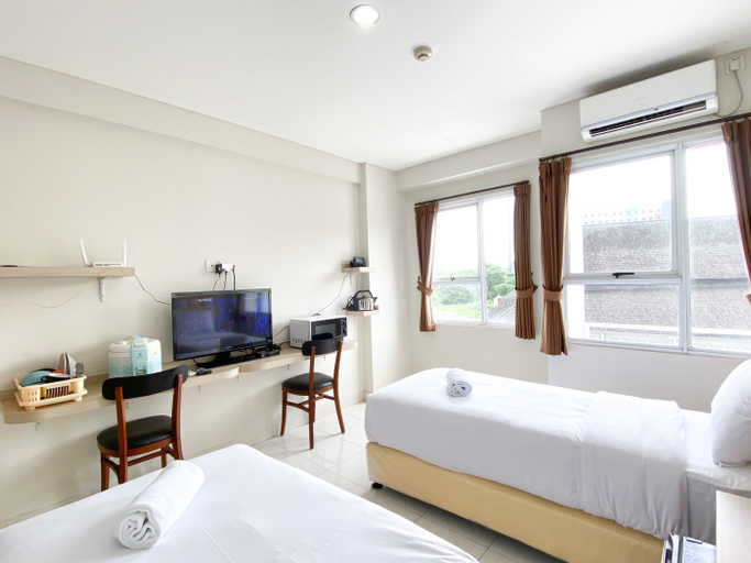 Bedroom 2, Good Choice and Comfy Studio (No Kitchen) at Elvis Tower Apartment By Travelio, Cikarang