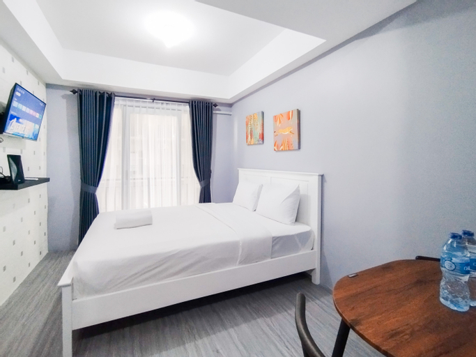 Bedroom 1, Modern Studio Room Apartment at Grand Asia Afrika By Travelio, Bandung